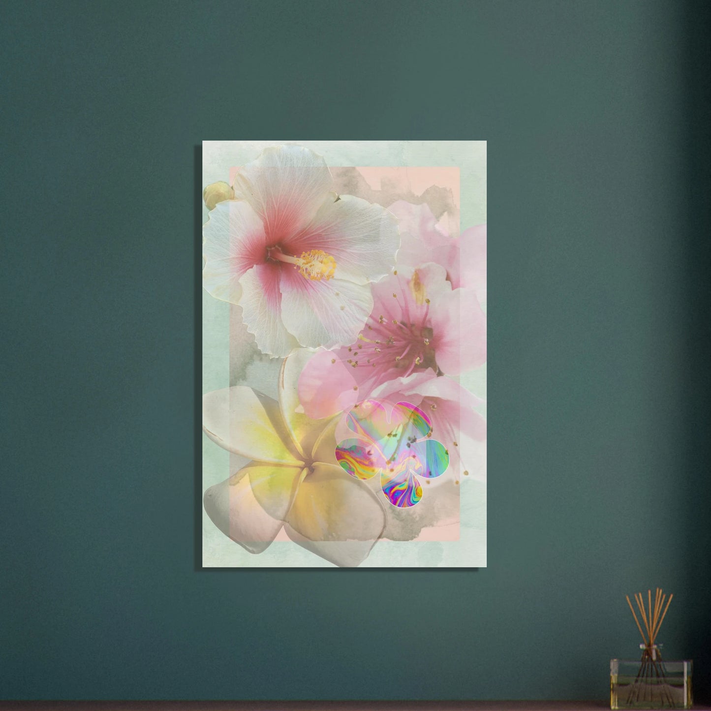 Framed floral art print with pastel hibiscus and a psychedelic bloom, displayed on a teal wall above a wooden shelf with a reed diffuser in a peaceful modern interior.