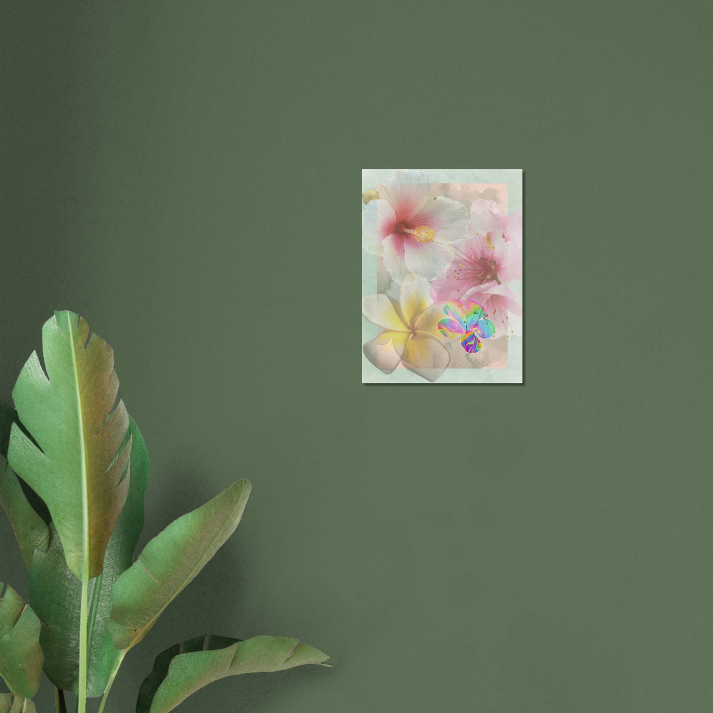Medium surreal botanical print displayed on a green wall with plant shadows, featuring hibiscus, cherry blossom, and iridescent floral detail.