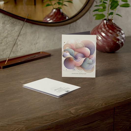Graceful Souls card displayed on a wooden desk with its envelope and sculptural accents, evoking a peaceful moment of thoughtful gifting.