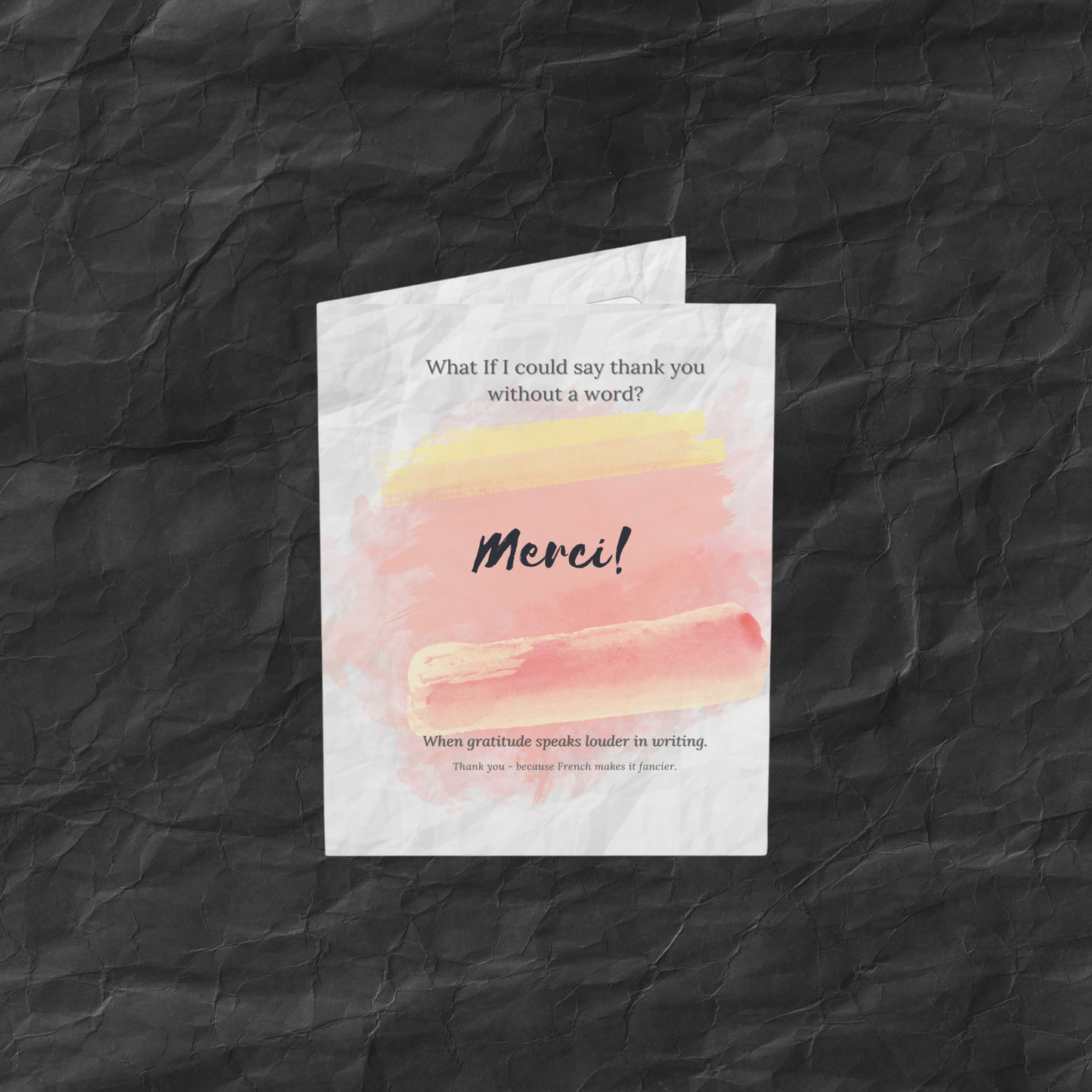 Merci French thank you card with watercolor pink and yellow brush strokes, designed to express gratitude with elegance and simplicity.