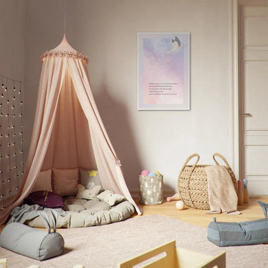 Soft pink pastel nursery with “New Light” baby wall art framed above toddler bed, styled in neutral tones