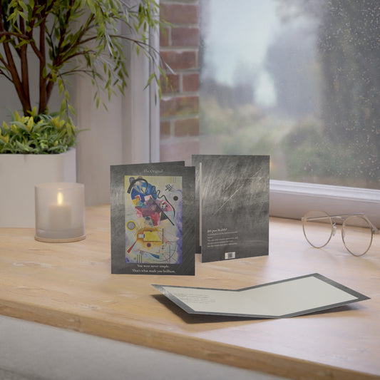 “The Original” art greeting card placed on a wooden desk beside a pen and notepad. A vibrant card for creative dads and mentors, ideal for Father’s Day or appreciation gifting.