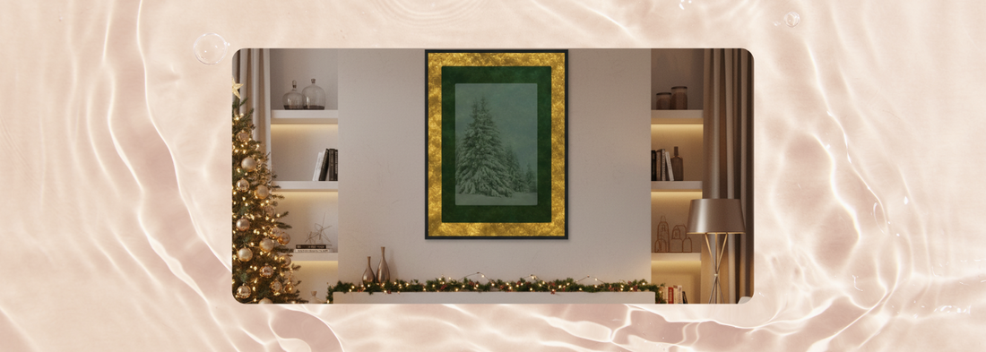 Framed Velvet Solstice winter art print of a snowy fir tree with gold brass border, styled in a cozy holiday living room with garland and Christmas tree.
