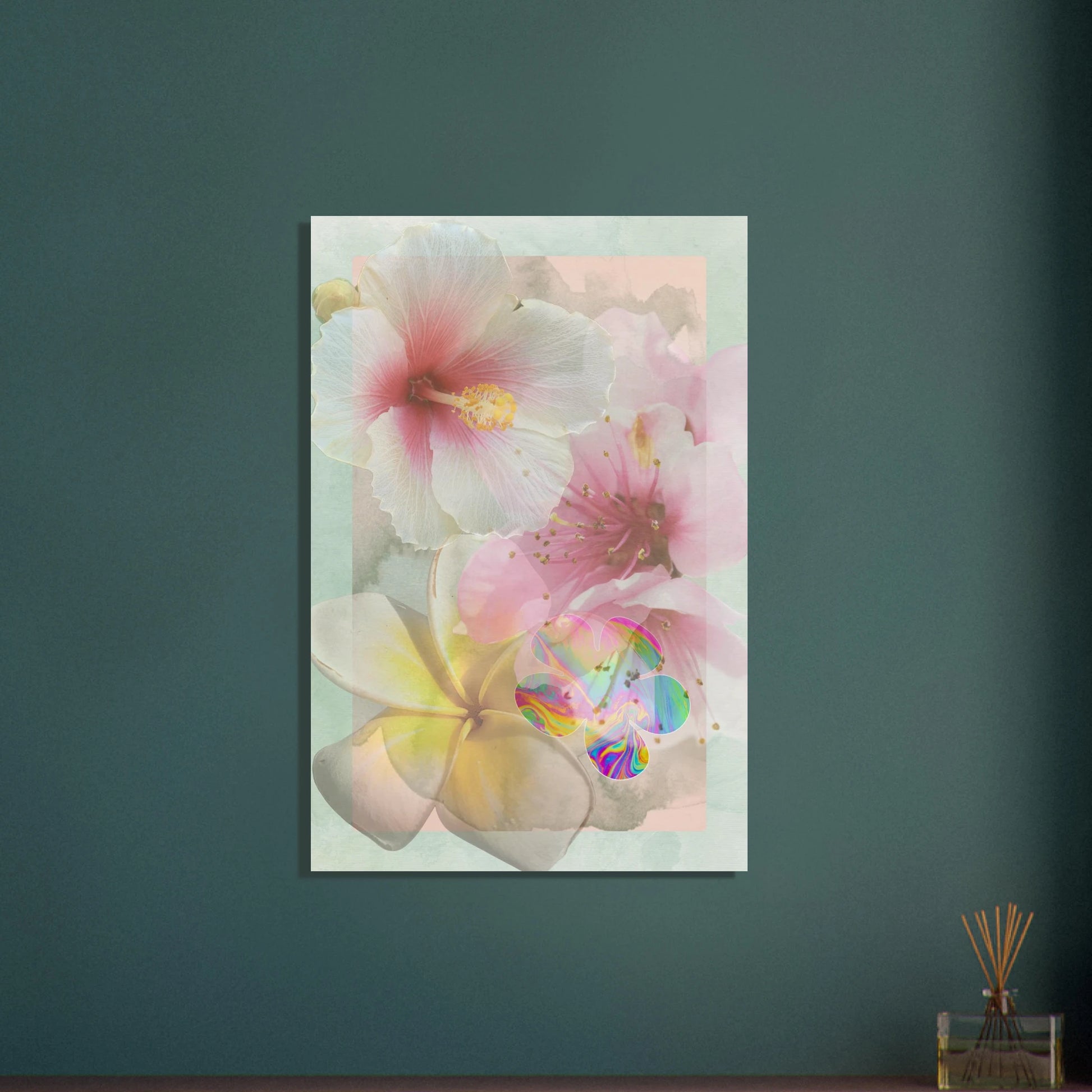 Framed floral art print with pastel hibiscus and a psychedelic bloom, displayed on a teal wall above a wooden shelf with a reed diffuser in a peaceful modern interior.