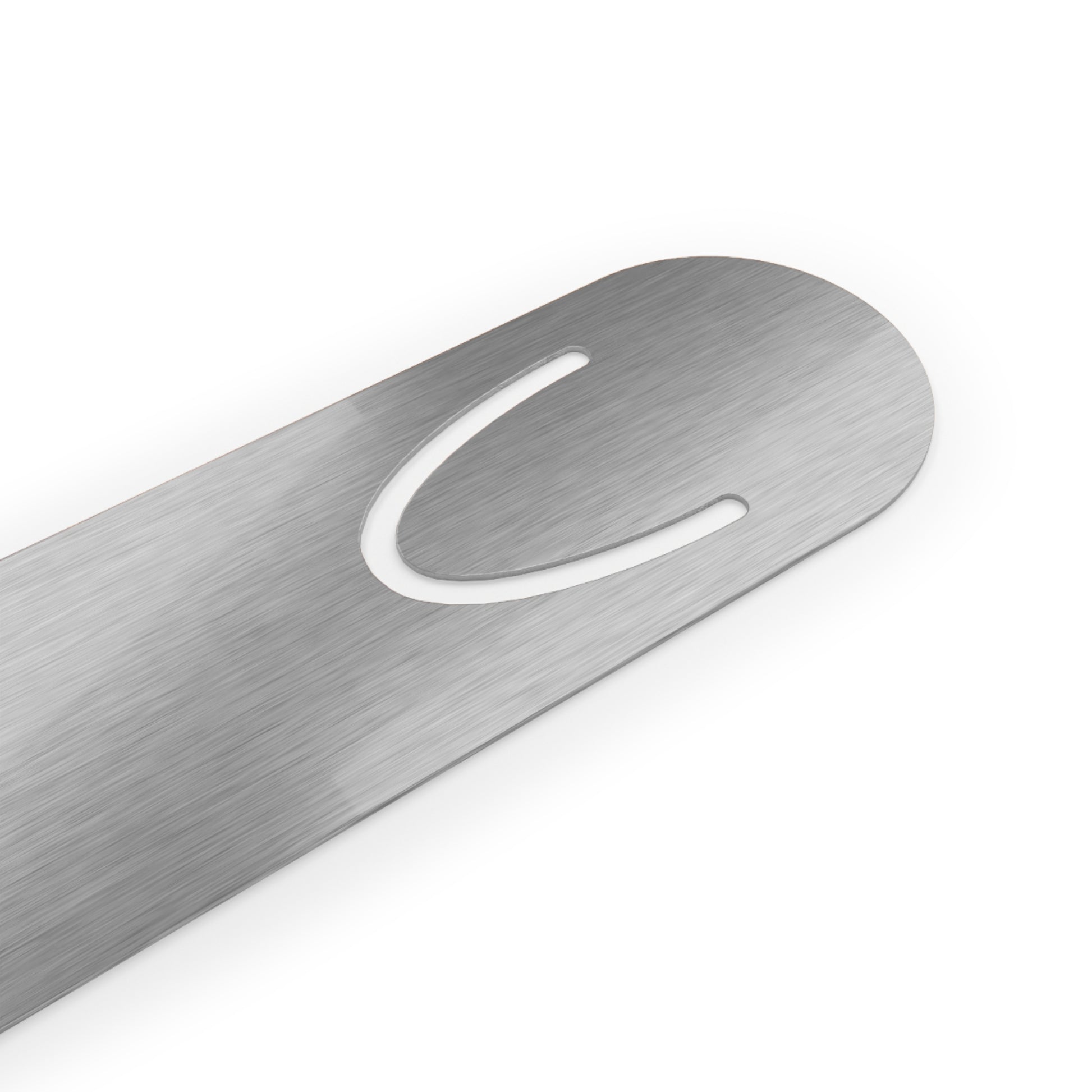 Close-up of aluminum bookmark with unique U-shaped slot and swirling amber artwork from the Whispers of Fall capsule