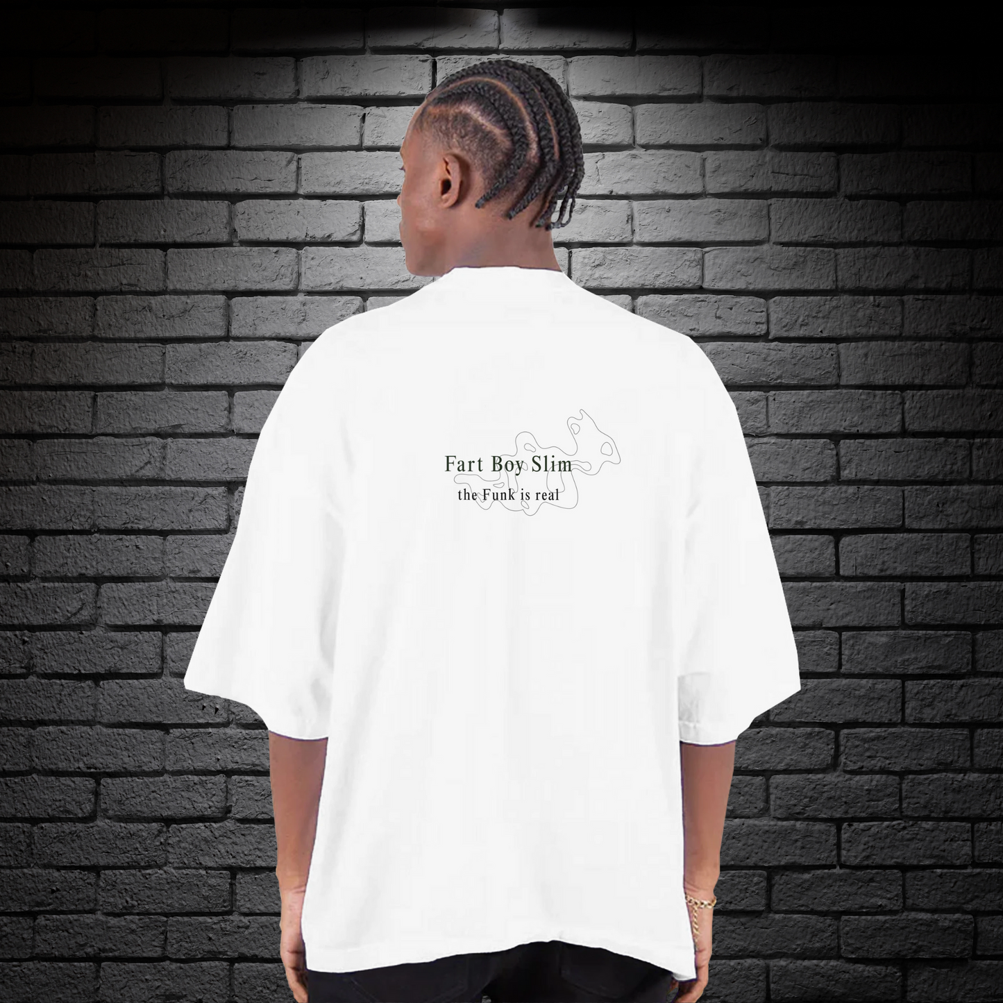 Back of white Fart Boy Slim tee featuring “the funk is real” text and minimalist puff graphic, worn against a black brick wall.
