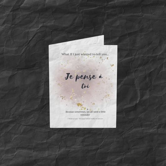 Front view of the Je pense à toi card from the What-If Collection by Printed Echoes Creations, elegant greeting card with soft grey tones and golden splashes on crinkled-style paper.