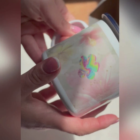 Unboxing and presentation of the Bloom Baby Bloom enamel mug, featuring soft pastel, floral design details, and a cozy  moment.

