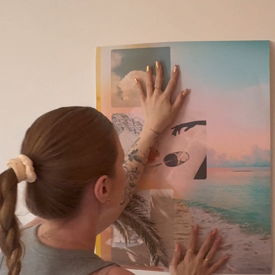 Unboxing and hanging the Summer Reverie wall art in a minimalist, sunlit home office with warm tones and calming decor.
