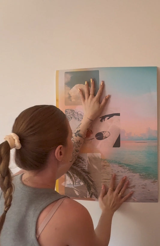 Unboxing and hanging the Summer Reverie wall art in a minimalist, sunlit home office with warm tones and calming decor.
