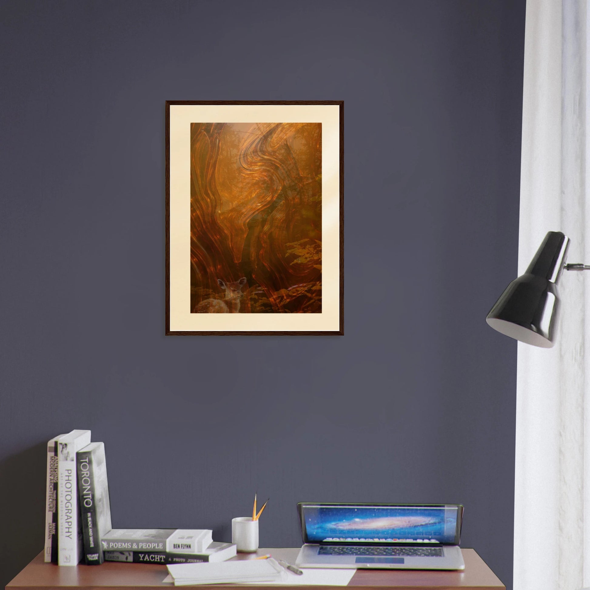 Printed Echoes Creations Whispers of Fall medium 18x24 framed wall art styled in a modern home office. Rich abstract autumn tones add warmth and creativity above a minimalist desk with books, laptop, and task lighting. A versatile statement piece sized perfectly for offices, study areas, and contemporary home decor.