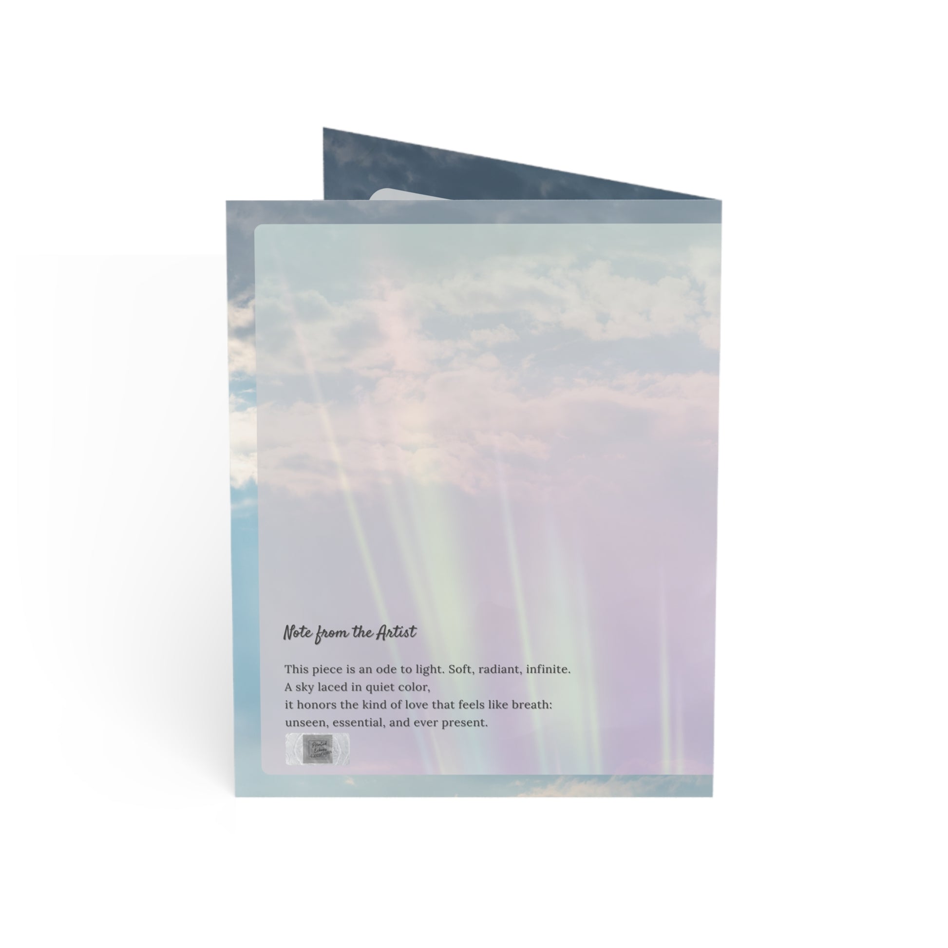 Back of the Sacred Light wedding card featuring a pastel sky with aurora tones and a poetic note from the artist about love as light—soft, radiant, and ever present.