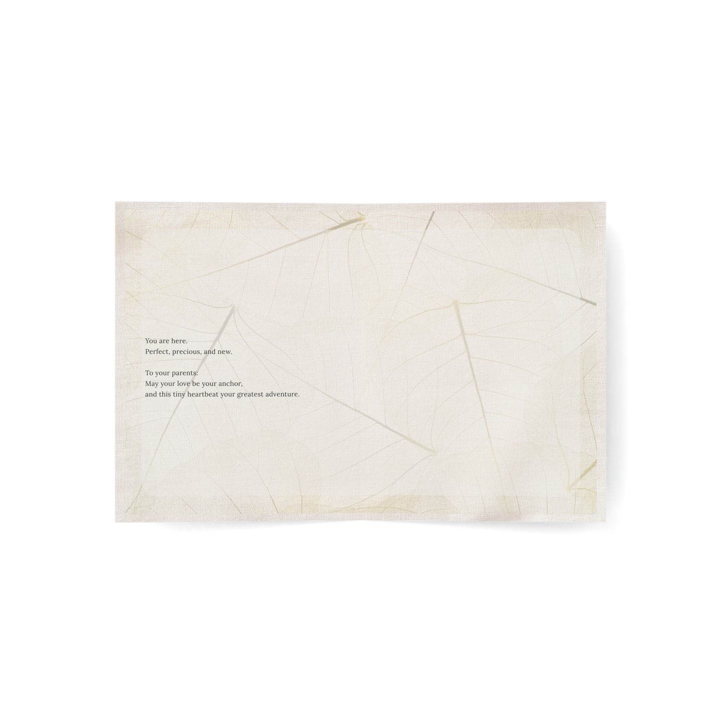 Inside of Soft Landing newborn card showing a poetic message for baby and parents on a soft leaf-textured background — a heartfelt gift for new beginnings.