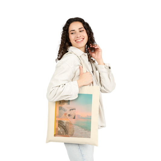Woman carrying Summer Reverie canvas tote bag with coastal collage artwork, styled for everyday and travel use
