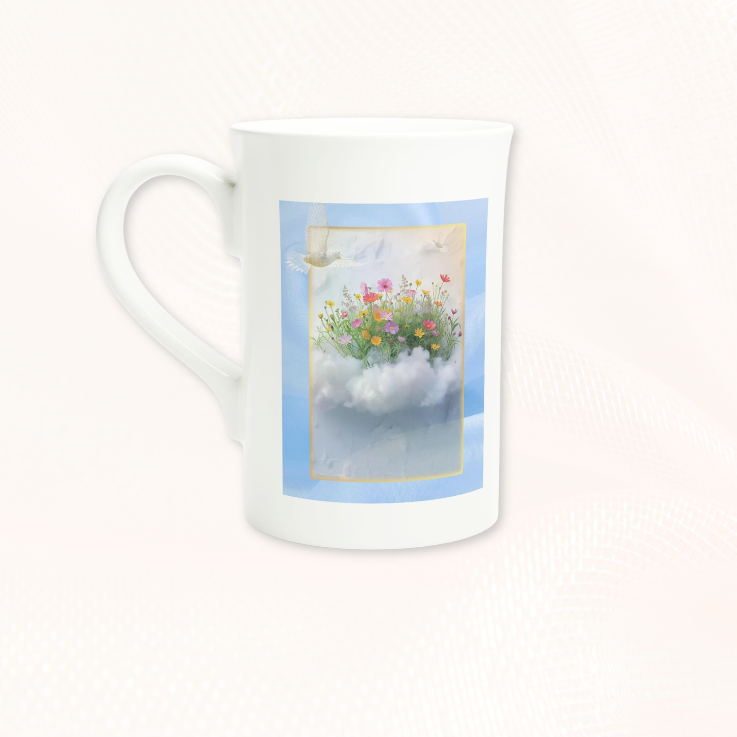 Detailed artwork of a floating floral cloud with wildflowers in a soft blue and pastel tones on a slim white porcelain mug from the Garden of Dreams capsule.