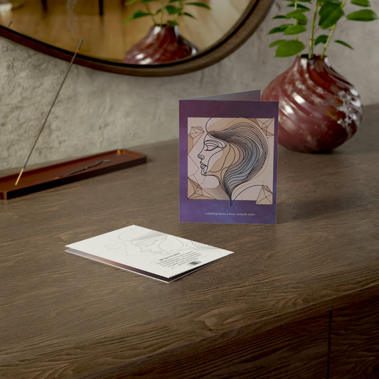 Feminine art card Unfolding Layers displayed in a serene desk setting with incense and pottery, showing both the abstract front design and poetic back text—a tribute to the complexity of womanhood.
